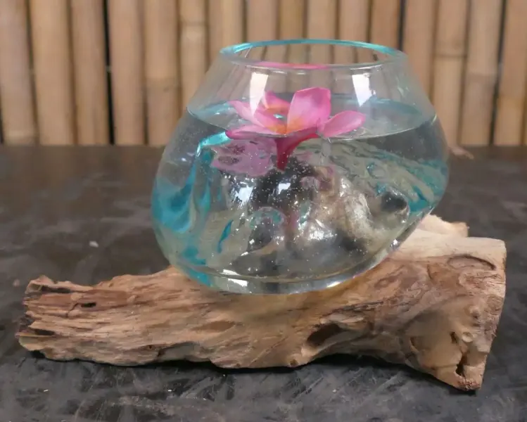 Product image 2 of the product “Driftwood with melted glass (Model 1 - narrow opening) on top as plant container. In the sizes from 10 to 30cm ”